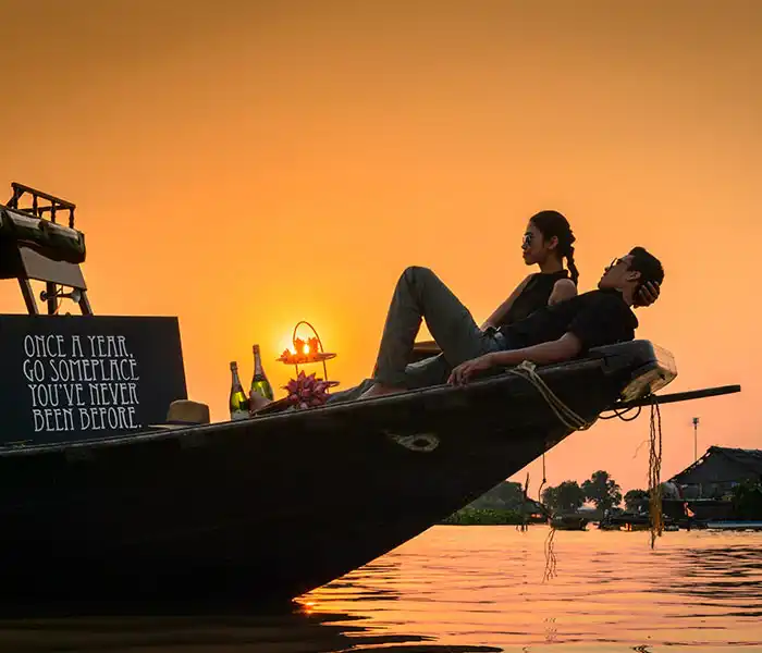 Sunset boat with cocktail_Serval Travel 